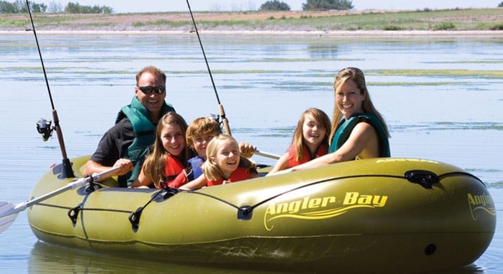 Family Fishing In Inflatable Boat