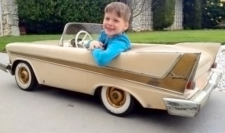 Tot In 4 Wheeled Toy Car